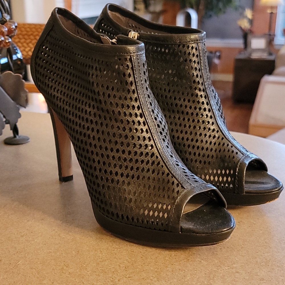 Black leather ankle peek-a-boo boots